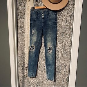 Refuge High Rise Distressed Jeans.